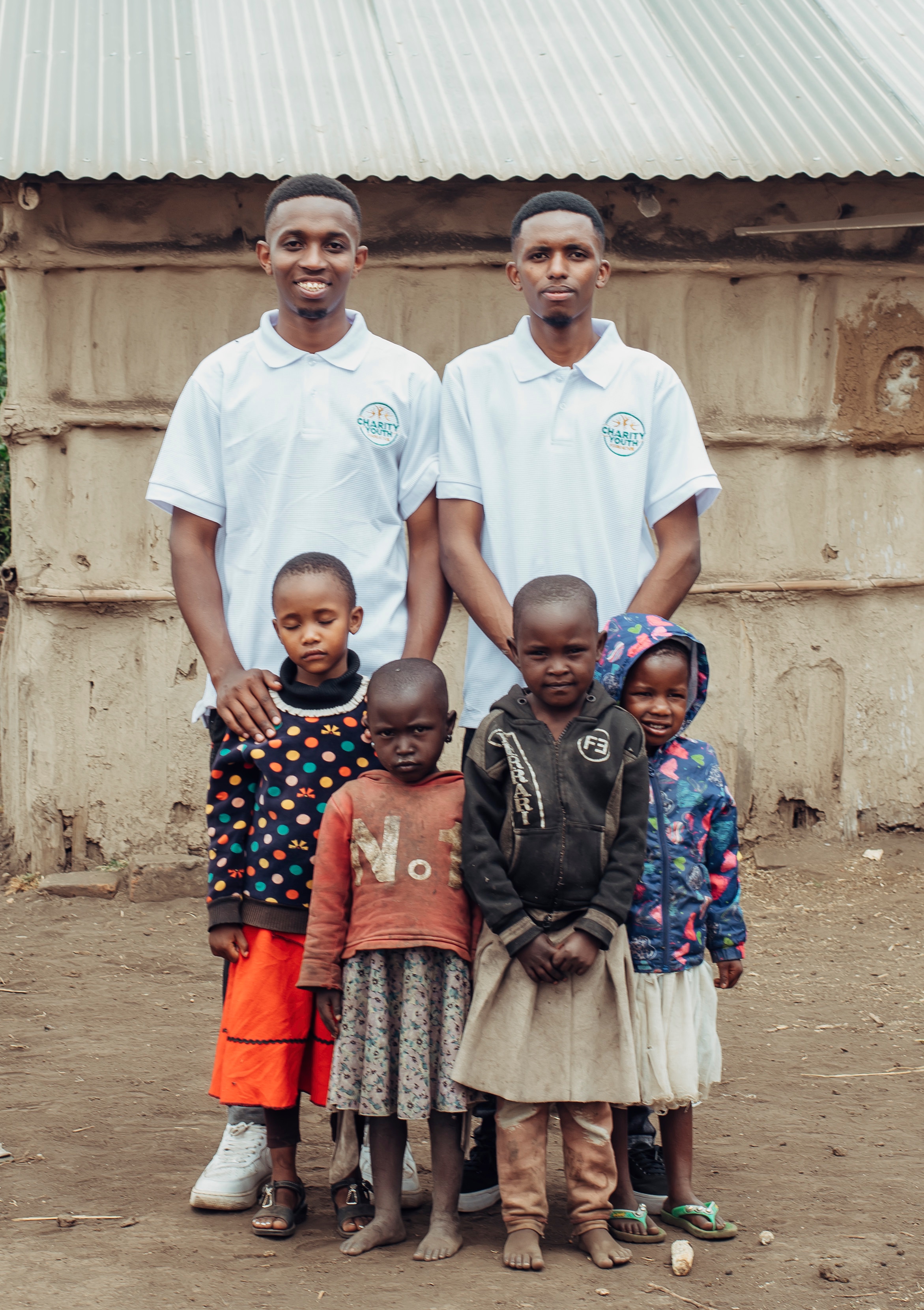Charity Youth Foundation team with children